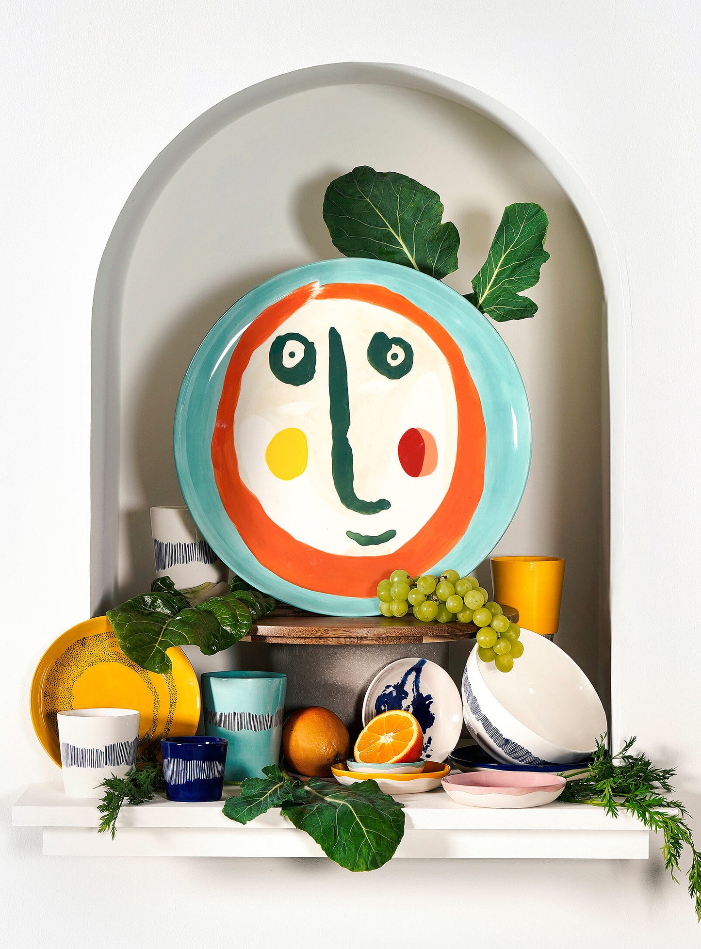 Feast painted-face serving plate