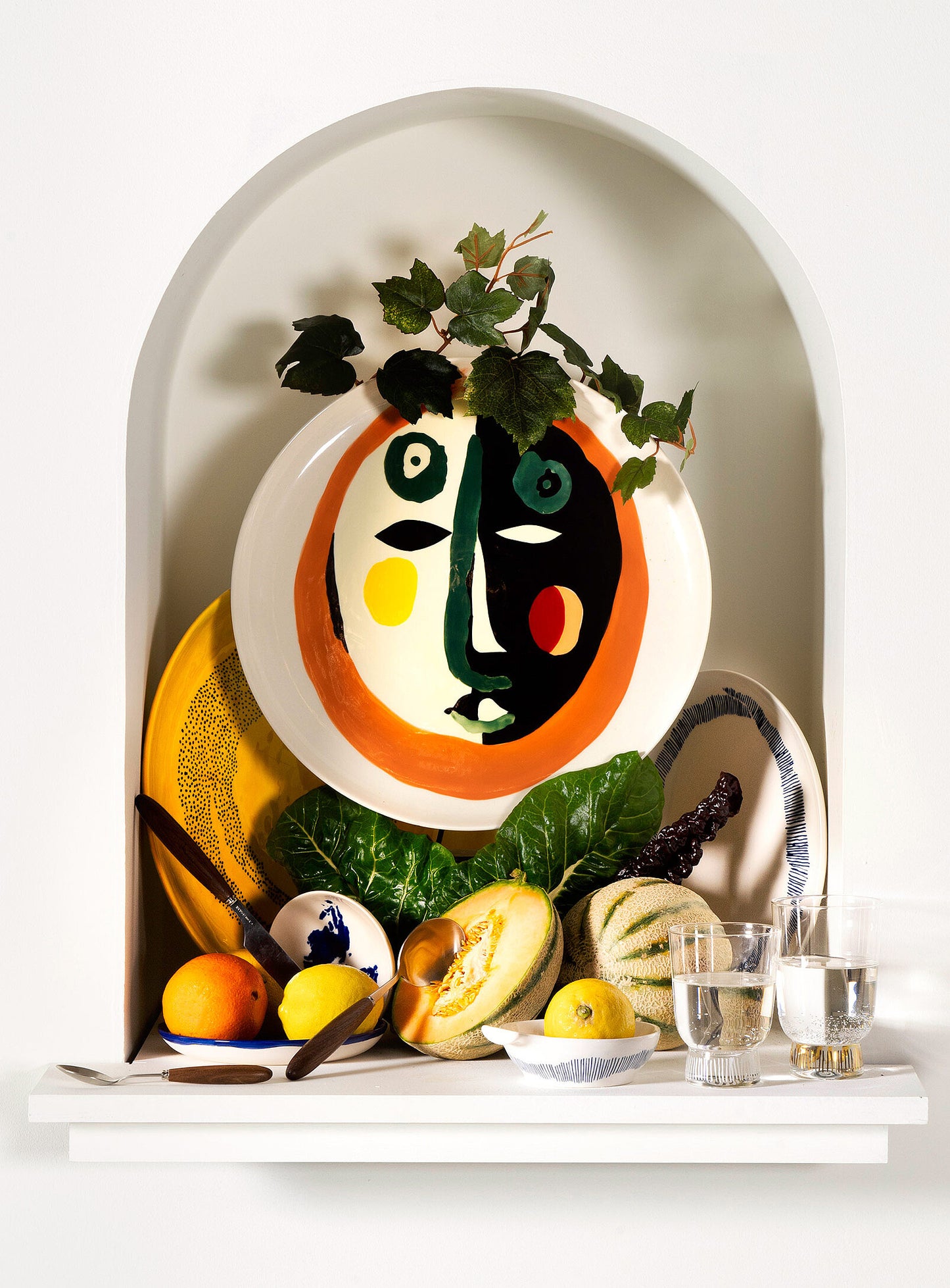 Feast painted-face serving plate